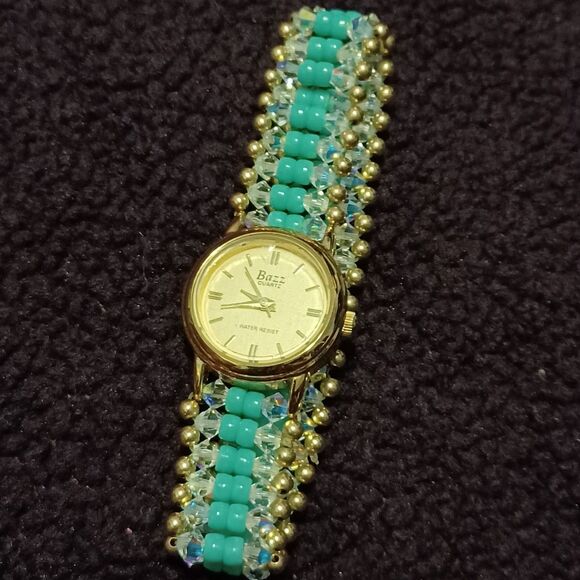 Bazz Accessories - BAZZ DELUXE Gold-Tone Watch, Elastic Blue and Clear Beaded Wristband, Bz-1016